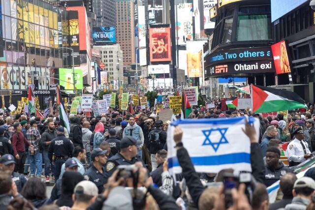 October 8, 2023, NEW YORK, NY, USA: People demonstrate in support of Palestinians and Israelis after the Palestinian militant group Hamas launched an attack on Israel in Times Square on October 8, 2023, in New York. Israel, reeling from the deadliest atta